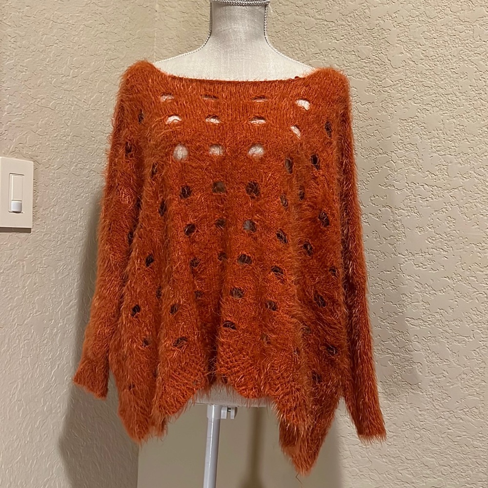 Pumpkin sweater off the shoulders. So unique size L/Xl